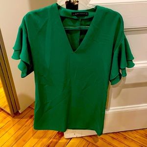 Green mini dress with ruffle sleeves